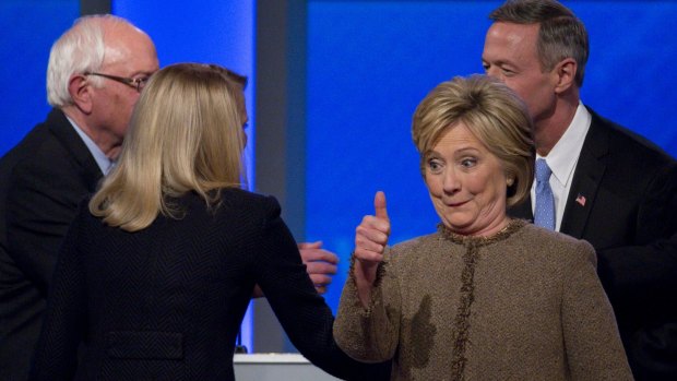 Hillary Clinton gives a thumbs-up after the Democratic presidential debate in Manchester, New Hampshire.
