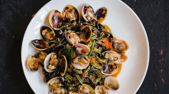 Saffron and squid ink linguine with Eyre Peninsula clams, tomato and basil at Lulu La Delizia.