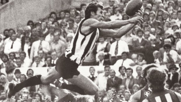 Phil Carman flies for a mark while playing for Collingwood in 1977.