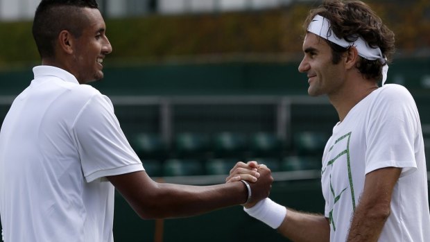 Anti-Fed: Nick Kyrgios shakes hands with Roger Federer after a practice session at Wimbledon.