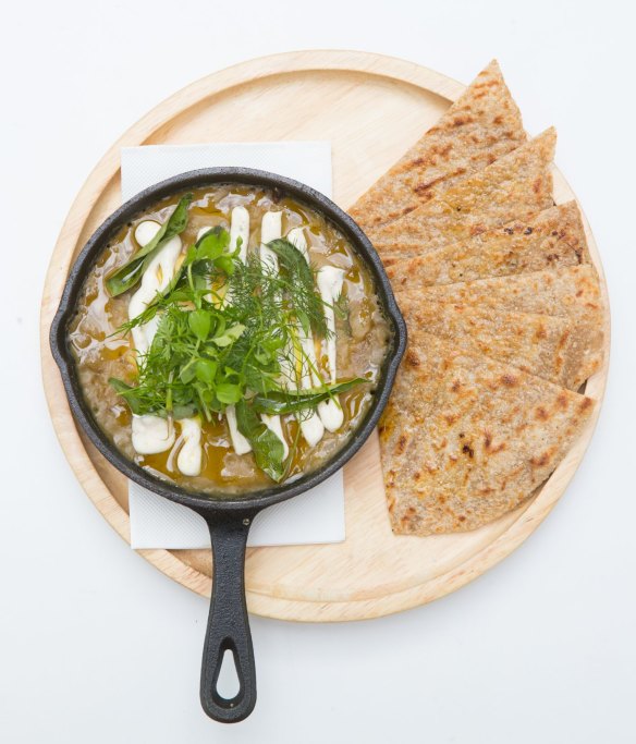 Indian-inspired baked eggs and flatbread.