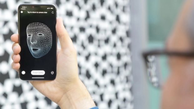 The app MeasureKit shows the wireframe model and other face data that the iPhone X opens to developers. 
