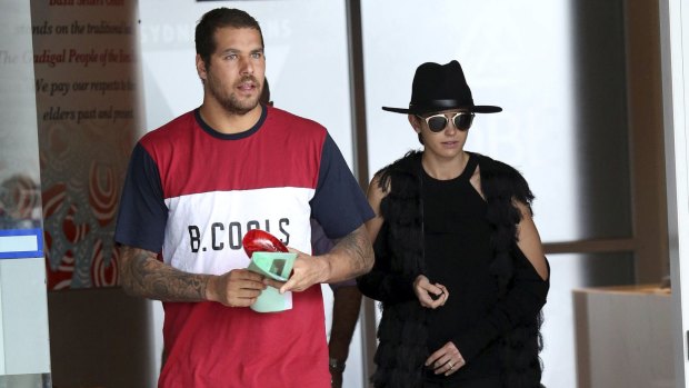 Lance Franklin and his fiancee Jesinta Campbell arrive at Sydney's headquarters on Wednesday.