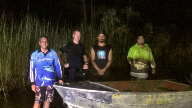 Wyndham police officers and locals pictured after rescuing the three tourists.