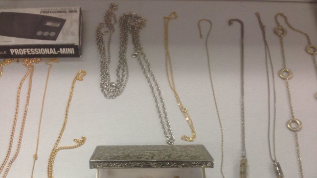 A collection of items recovered by police, including baby teeth apparently belonging to 'Garth'.