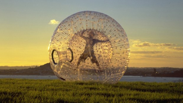 Zorbing involves rolling down a hill inside an inflatable, clear plastic zorb. 
