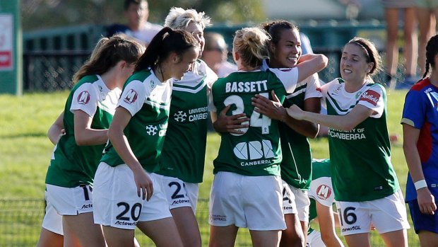 Canberra United players celebrate the goal of Toni Pressley.