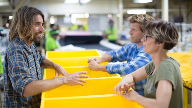 Surfer Dave Rastovich out of his comfort zone at a garment factory.