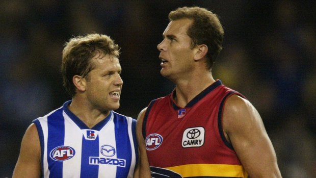 Confrontation: Glenn Archer gets in Wayne Carey's face during a round six match in 2003.