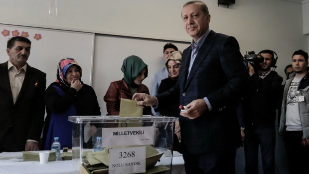 Turkish President Tayyip Erdogan casts his ballot at a polling station on November 1, in Istanbul, Turkey.