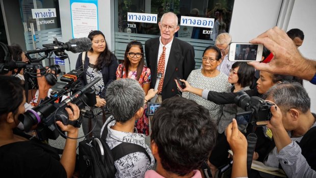 Alan Morison and Chutima Sidasathian with family and supporters at the courthouse in Phuket.