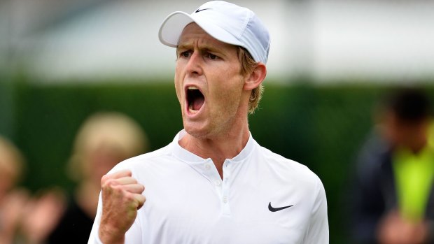 Luke Saville makes his way through Wimbledon qualifying against Aldin Setkic, of Bosnia and Herzegovina.