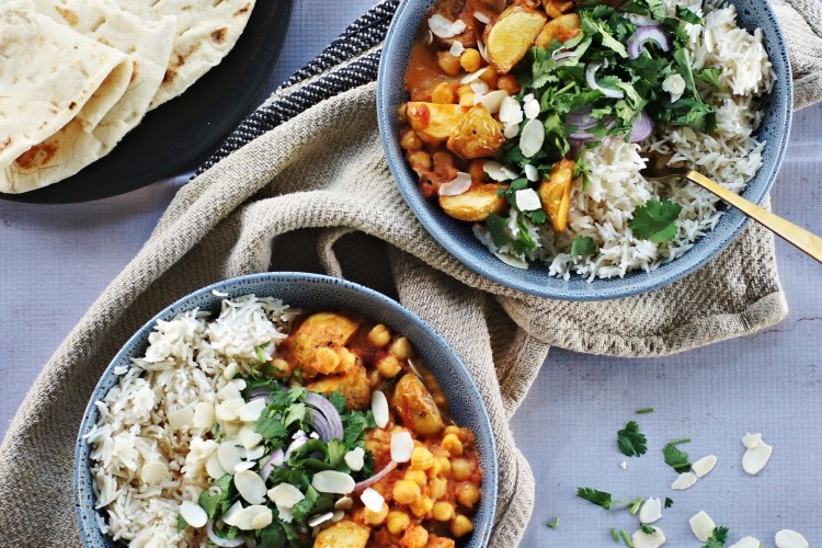 Roast potato and chickpea creamy Bengali-style curry recipe. Four vegetarian and vegan curries for Good Food July 2018. Please credit Katrina Meynink.