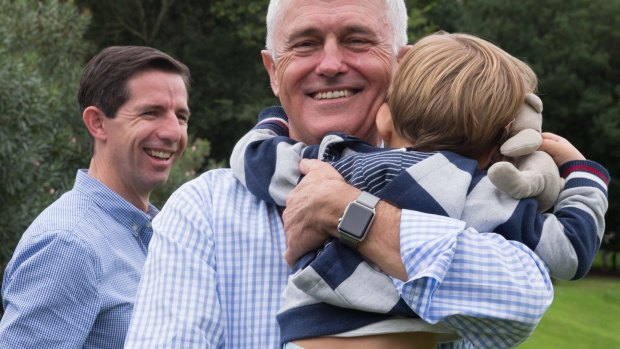 Shell out for the children: Prime Minister Malcolm Turnbull, pictured with his grandson, Jack Turnbull Brown, and Minister for Education and Training Simon Birmingham.