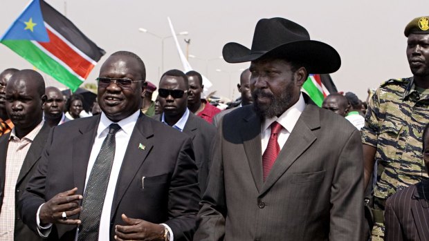 South Sudanese President Salva Kiir, centre-right, and then vice-president Riek Machar, centre-left in 2011. 
