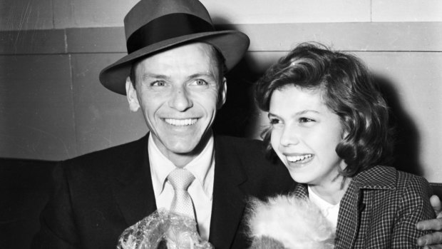 Frank Sinatra arrives in Sydney with his daughter Nancy in January 1955.
