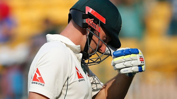 Shaun Marsh heads for the stands after his incorrect dismissal.