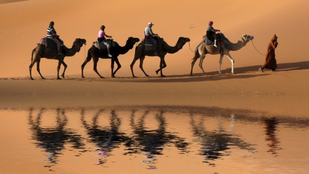 Travel is a mind-opening experience. Try, for example, a camel caravan in the Sahara Desert, Morocco.

