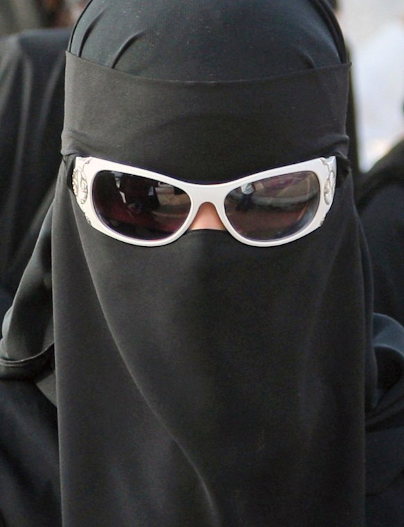 A Saudi women attends the traditional Arda dance, or War dance, during the Janadriyah Festival of Heritage and Culture, on the outskirts of the Saudi capital Riyadh.