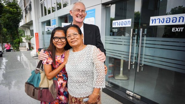 Alan Morison and Chutima Sidasathian with Chutima's mother after their acquittal in Phuket.