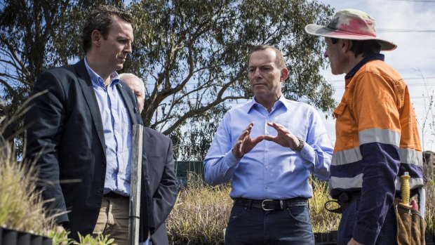 Prime Minister Tony Abbott speaks with members of Greening Australia after the  launch of the Cumberland Woodlands Round.