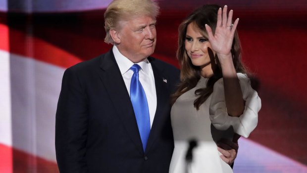  Donald Trump with wife Melania after her speech during the opening day of the convention.