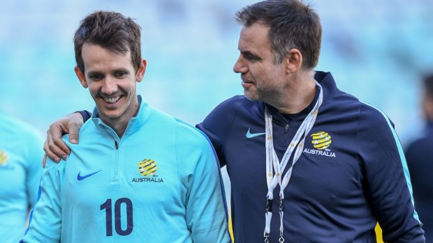 Ante Milicic (right) with Socceroo Robbie Kruse.