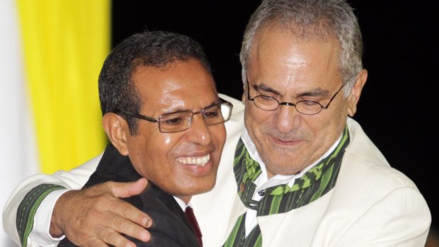 East Timorese President Taur Matan Ruak, left, embraces his predecessor Jose Ramos-Horta during his inauguration ceremony in Dili, East Timor, in 2012.