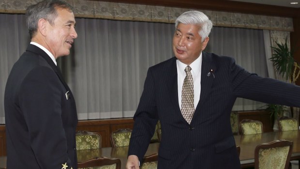 US Navy Admiral Harry B. Harris jnr, left, commander of the US Pacific Command, and Japanese Defence Minister Gen Nakatani prior to a meeting in Tokyo this month.