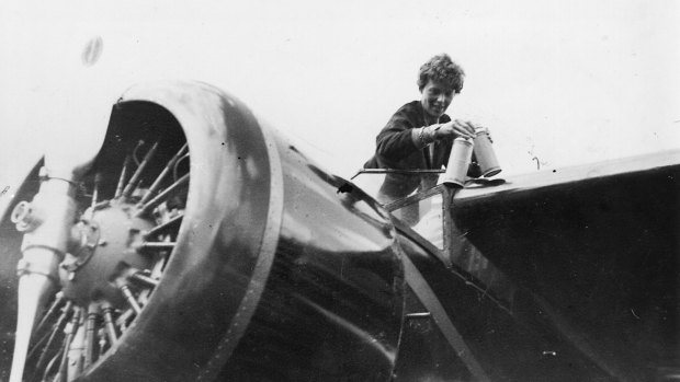 American aviator Amelia Earhart in the cockpit of her aeroplane at Culmore, near Derry, Ireland, after her solo Atlantic flight.