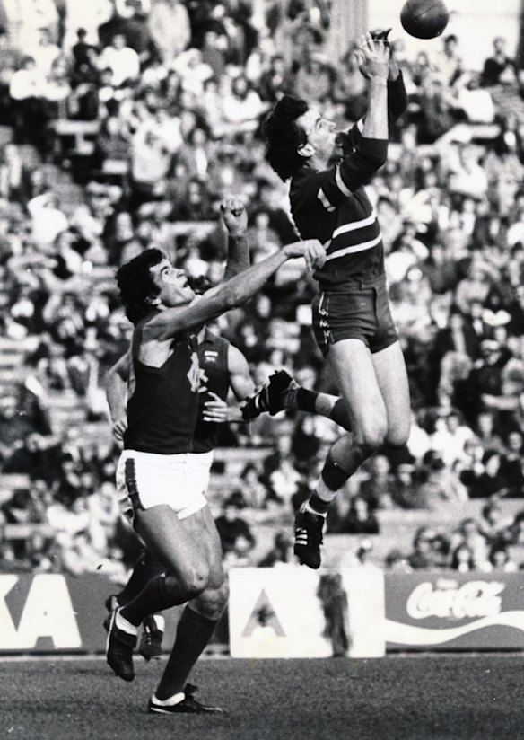 Kevlin Templeton in his playing days with Footscray, taking a mark in 1979.