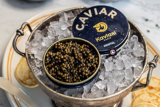Caviar is served with blinis, brioche, creme fraiche and chives at Whalebridge.