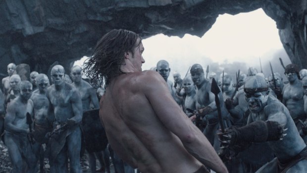 Alexander Skarsgard (back to camera) in the film The Legend of Tarzan.