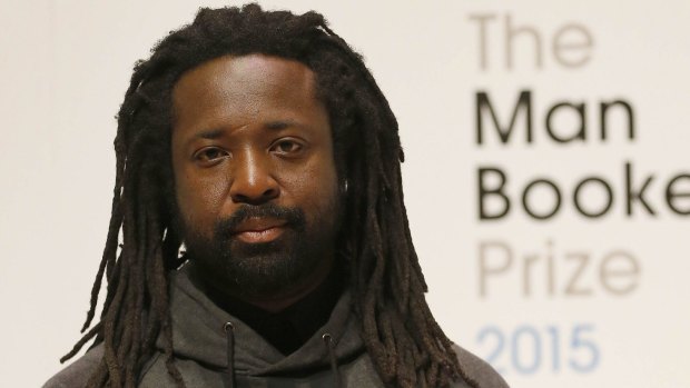 Author Marlon James poses on stage at the Royal Festival Hall in London.