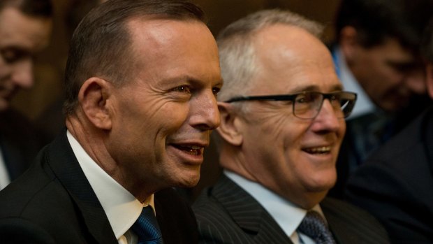 Prime Minister Tony Abbott and Malcolm Turnbull at the Federal Liberal Party Council in Melbourne on Saturday.