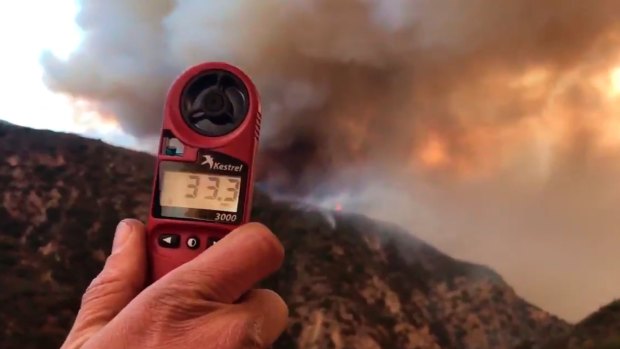 Santa Barbara County Fire Department, a wind speed indicator held by a US Forest Service fire fighter.