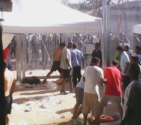 The Refugee Action Coalition says this picture shows the attacks on protesters at Manus Island on Friday.