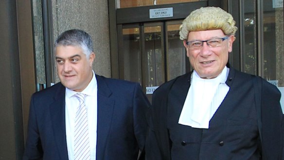 Nick Di Girolamo (left) leaves court.