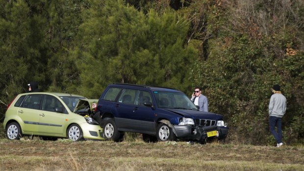 A crash on the Monaro Highway. The ACT government's first citizen jury will look at proposed changes to compulsory third-party insurance.