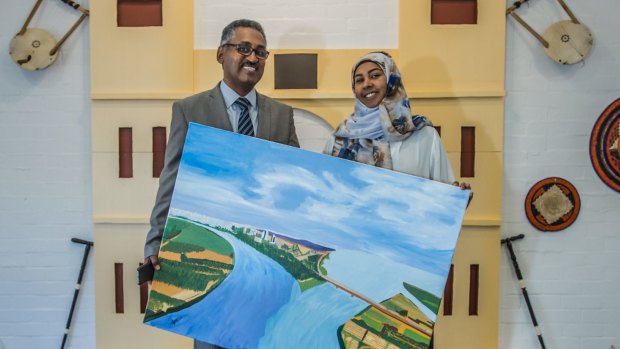 New Sudanese ambassador Dr Ibrahim Baroudi, his wife Riham Abdullah Mahmoud Elnazir, and their exhibition - the ambassador's wife made some of the art in the exhibition.