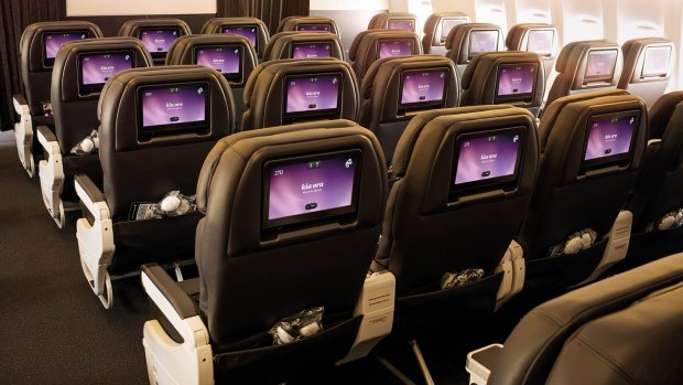 Premium economy seating features universal power and USB points.