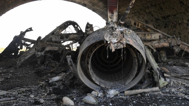The aftermath: A plane burned as a result of the US missile attack on an air base in Syria.