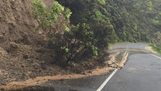 The side of a hill had slipped down on to the Great Ocean Road thanks to the heavy rain.