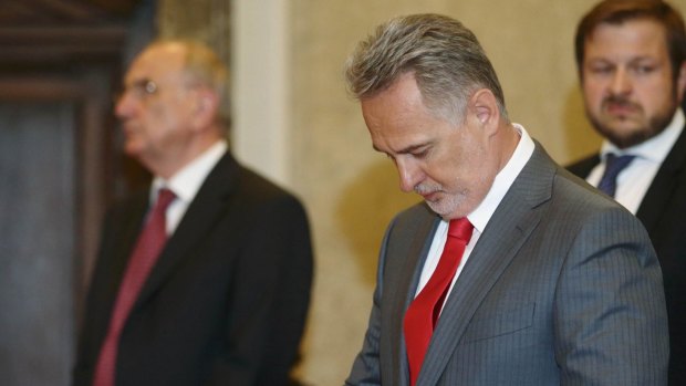 Firtash in court with his lawyers.