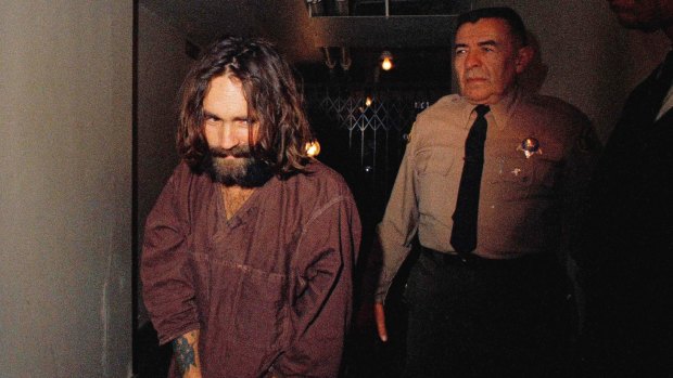 Charles Manson is escorted to court in Los Angeles during an arraignment phase in 1969. 