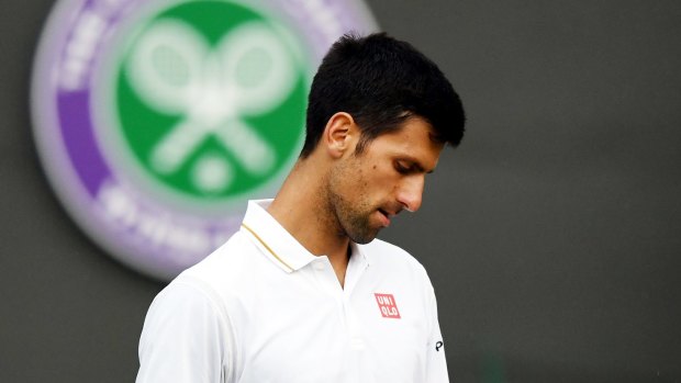 Novak Djokovic looking dejected during his third round match against Sam Querry.
