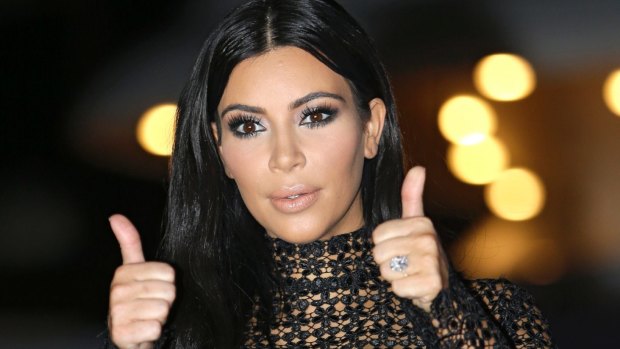 Thumbs up for natural? Kim Kardashian.