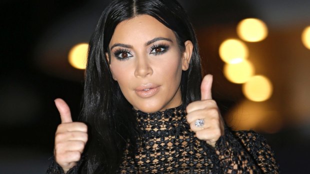Thumbs up for finding a direction? Kim Kardashian.