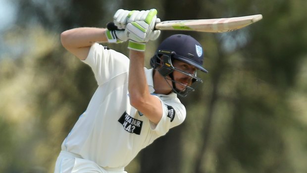 Stranded: Daniel Hughes was 98 not out, just short of a century.