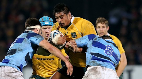 Leading from the front: Will Skelton charges into the Barbarians defence in Bordeaux.